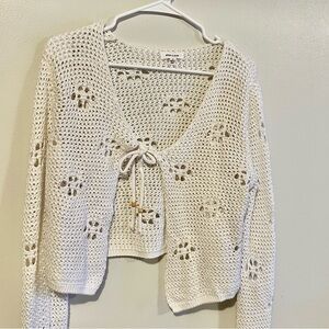 Chic White V-Neck Sweater with Tie Detail